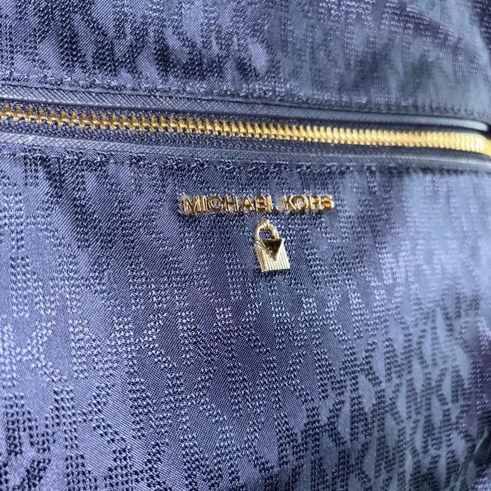 Michael Kors navy Dallas Medium Signature Logo Backpack like new condition